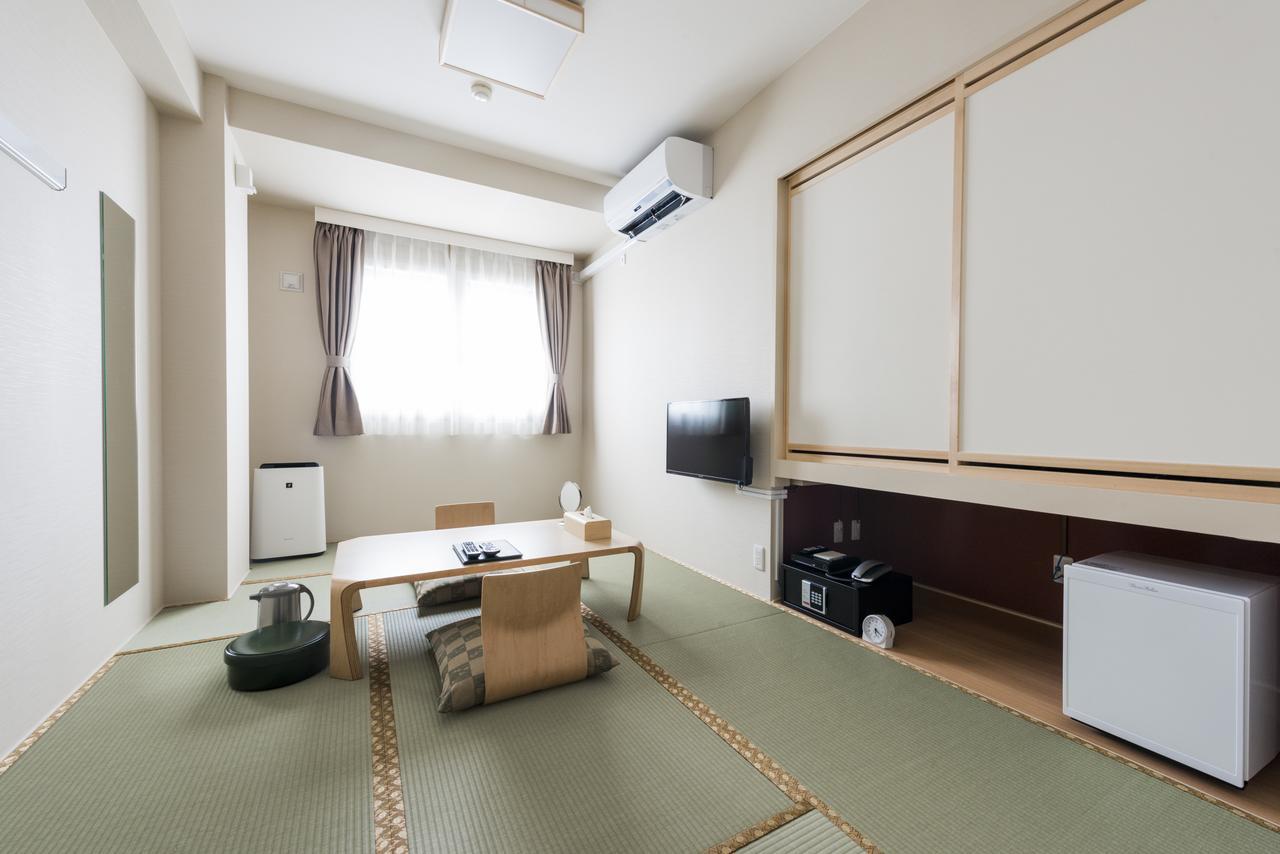 Tomakomai Hotel Sugita Bagian luar foto