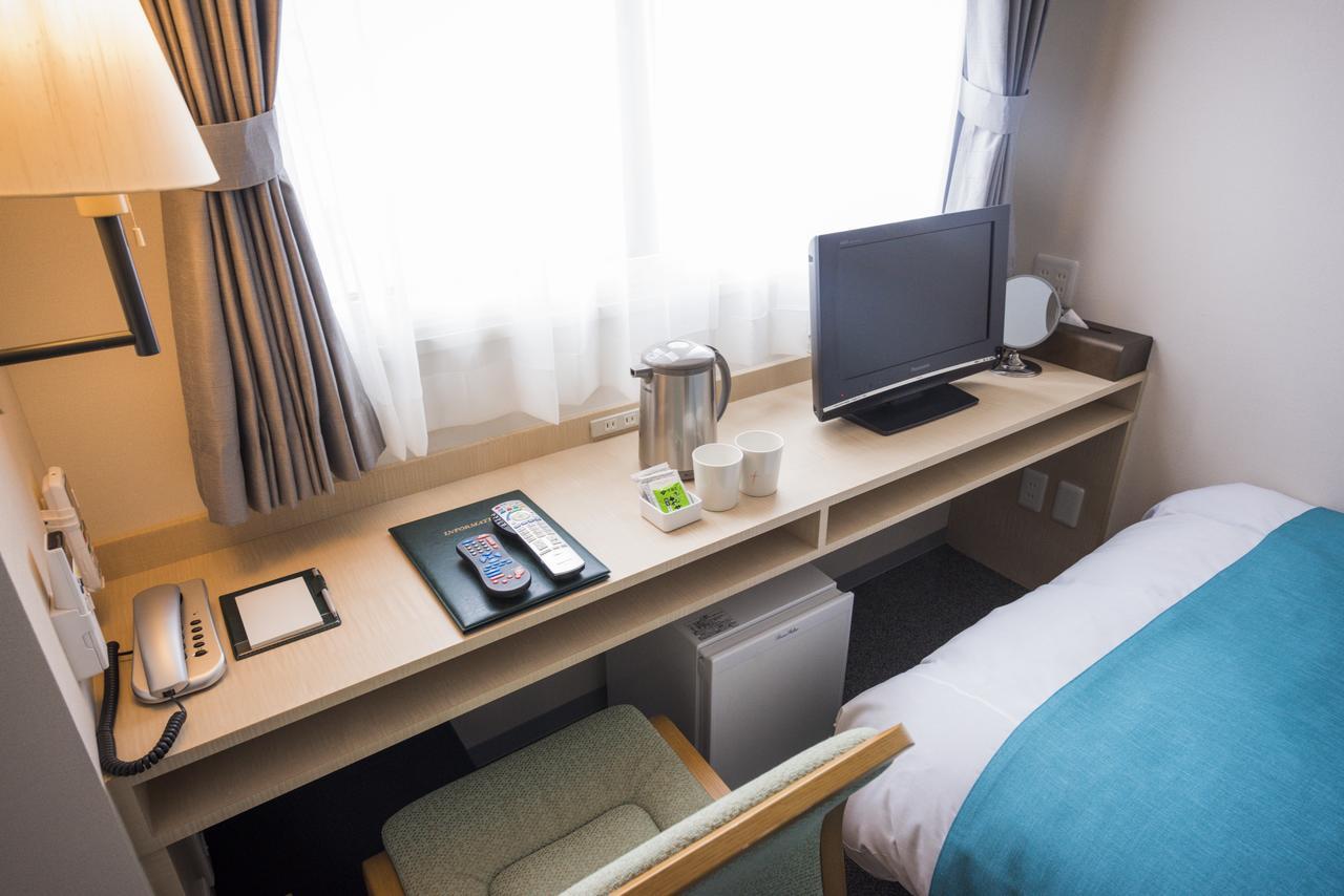 Tomakomai Hotel Sugita Bagian luar foto